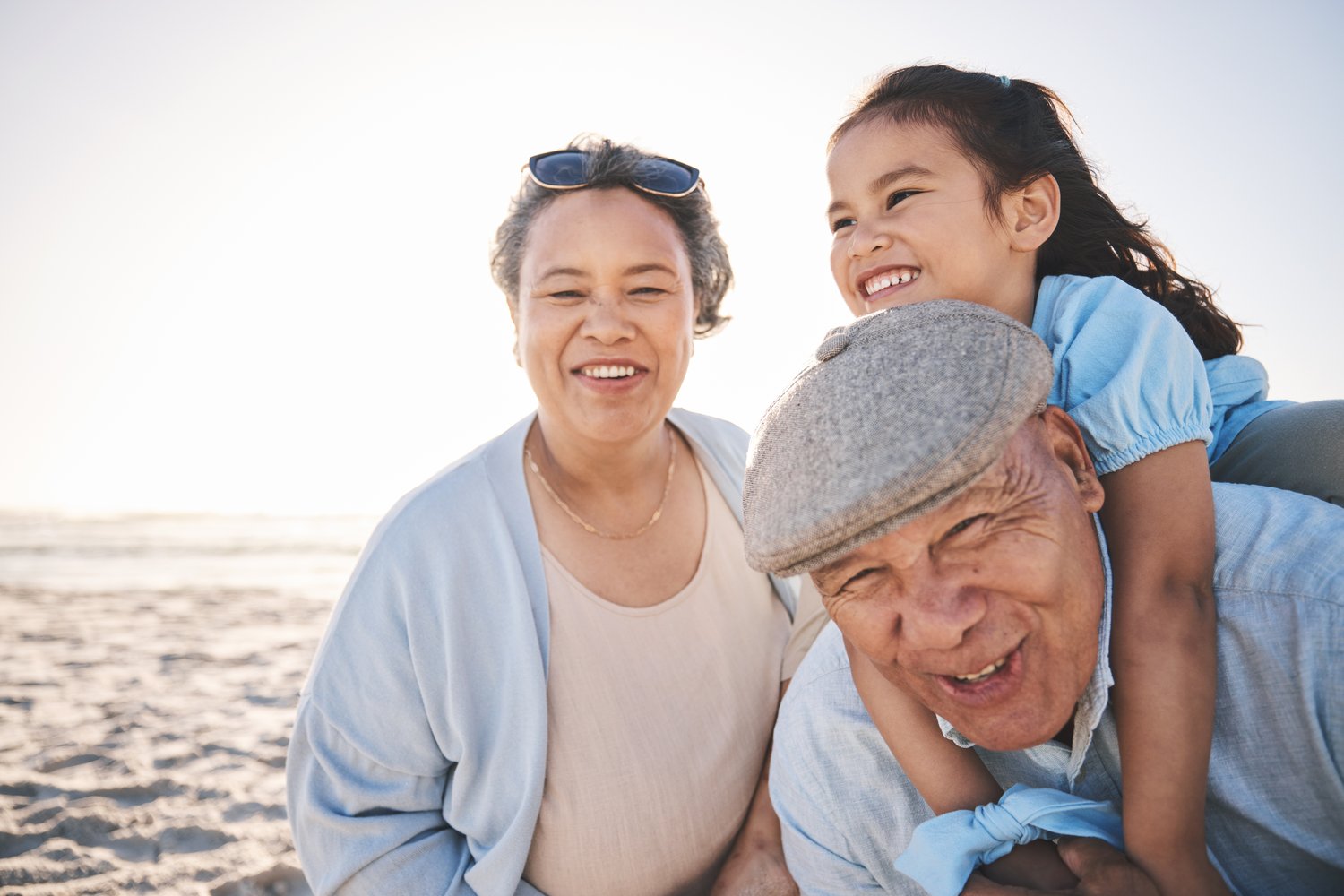 fun-beach-and-girl-playing-with-her-grandparents-2026-01-09-10-25-14-utc