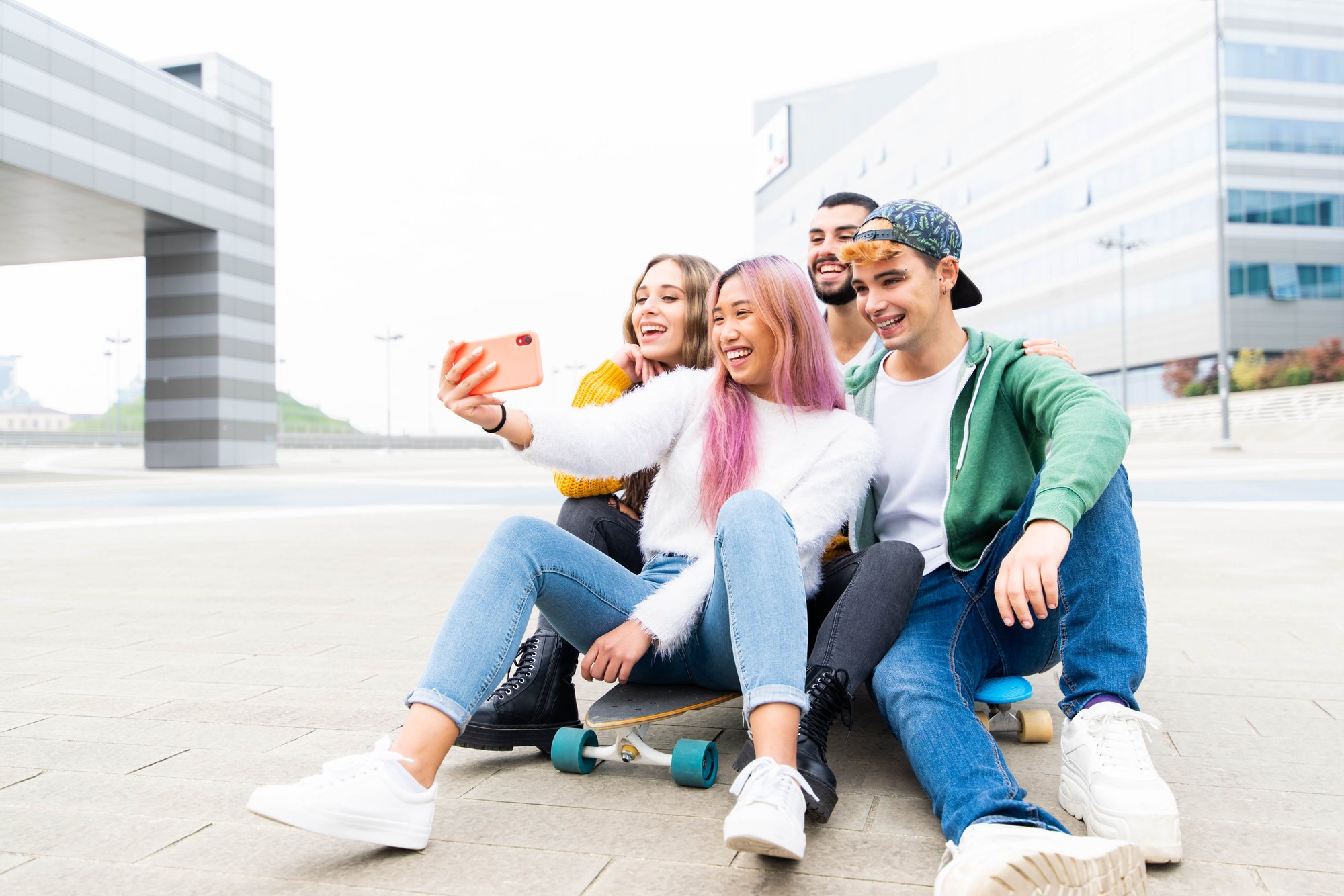 group-of-young-friends-taking-a-selfie-in-the-city-2022-12-17-03-38-08-utc group-of-young-friends-taking-a-selfie-in-the-city-2022-12-17-03-38-08-utc