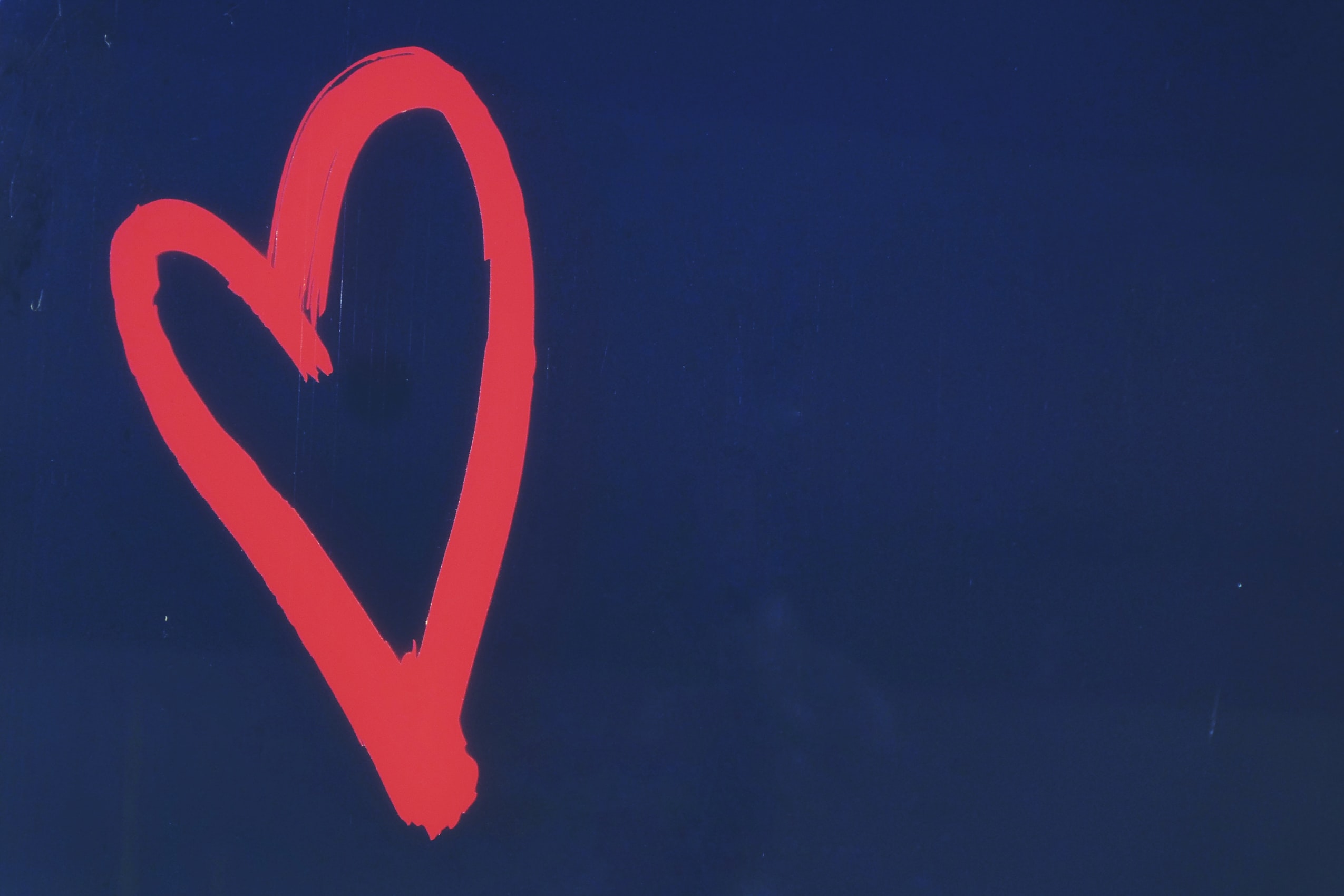 red heart on blue background